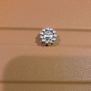 Silver Smiling Flower Charm